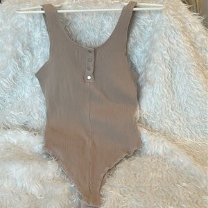 Shinestar Bodysuit Nude Ribbed Neckline Snaps and Closure Stretchy